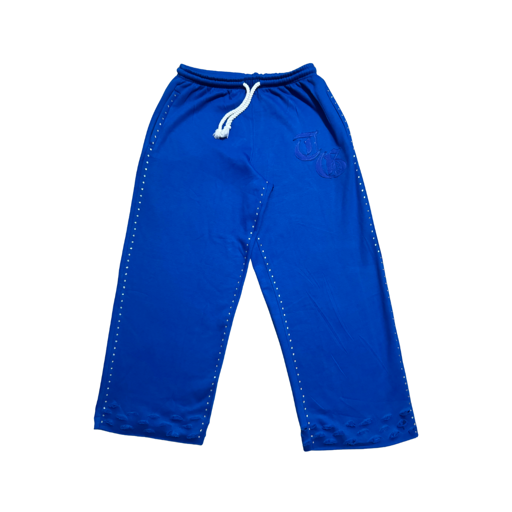 Blue front view of TG Rhinestone oversized, distressed rhinestone sweatpants. 