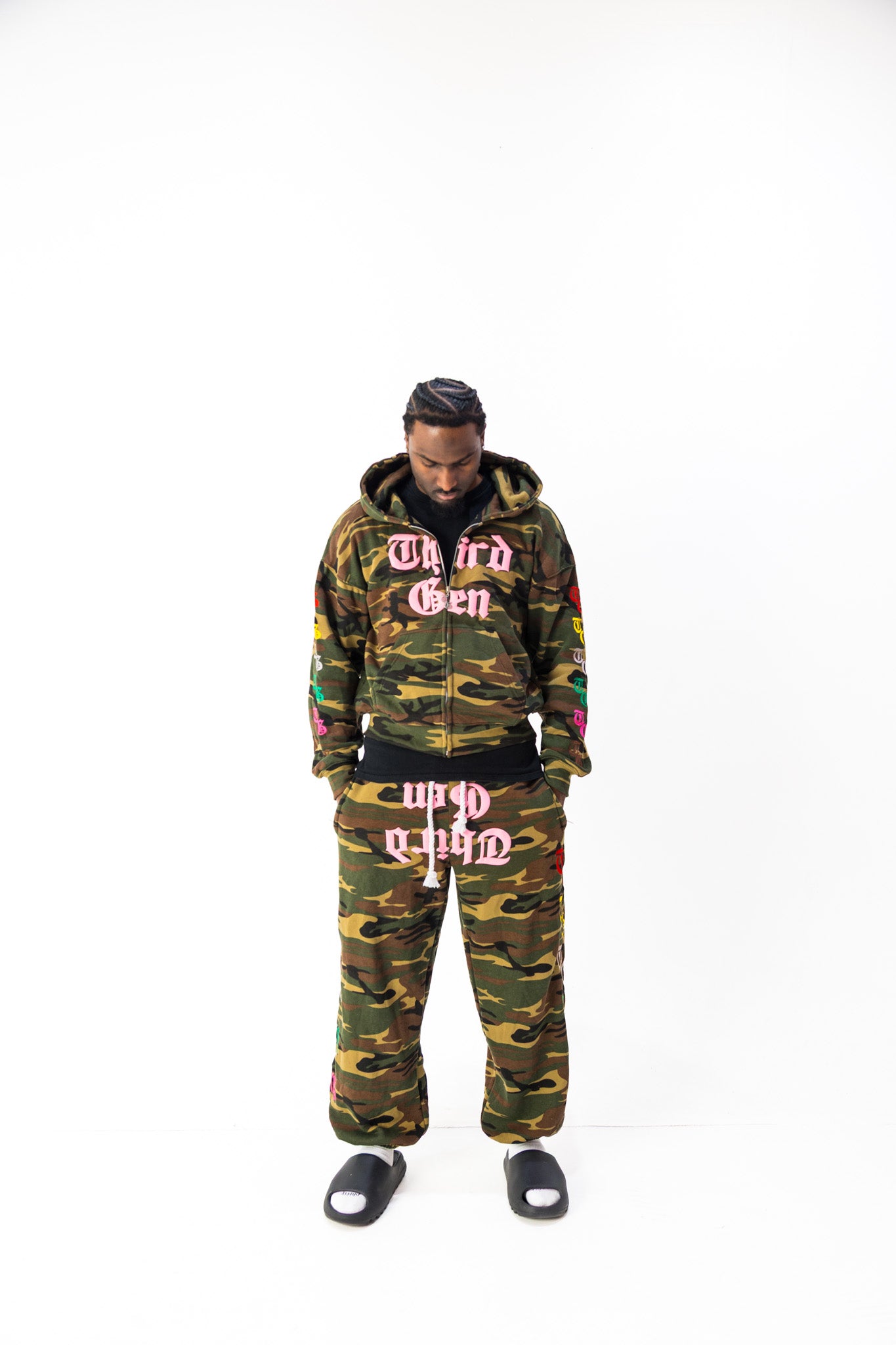 Front model view of Third Gen Camo oversized sweatpants.
