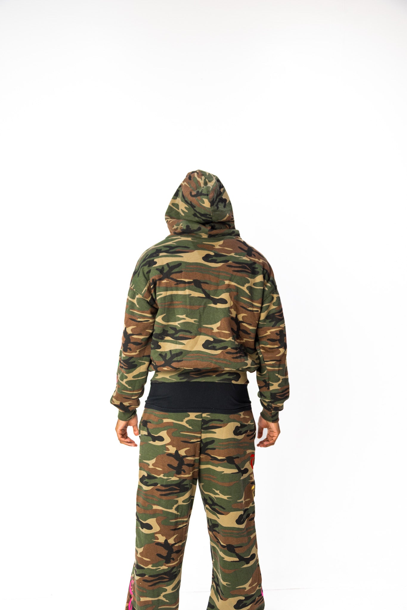 Back model view of Third Gen Camo oversized jacket.