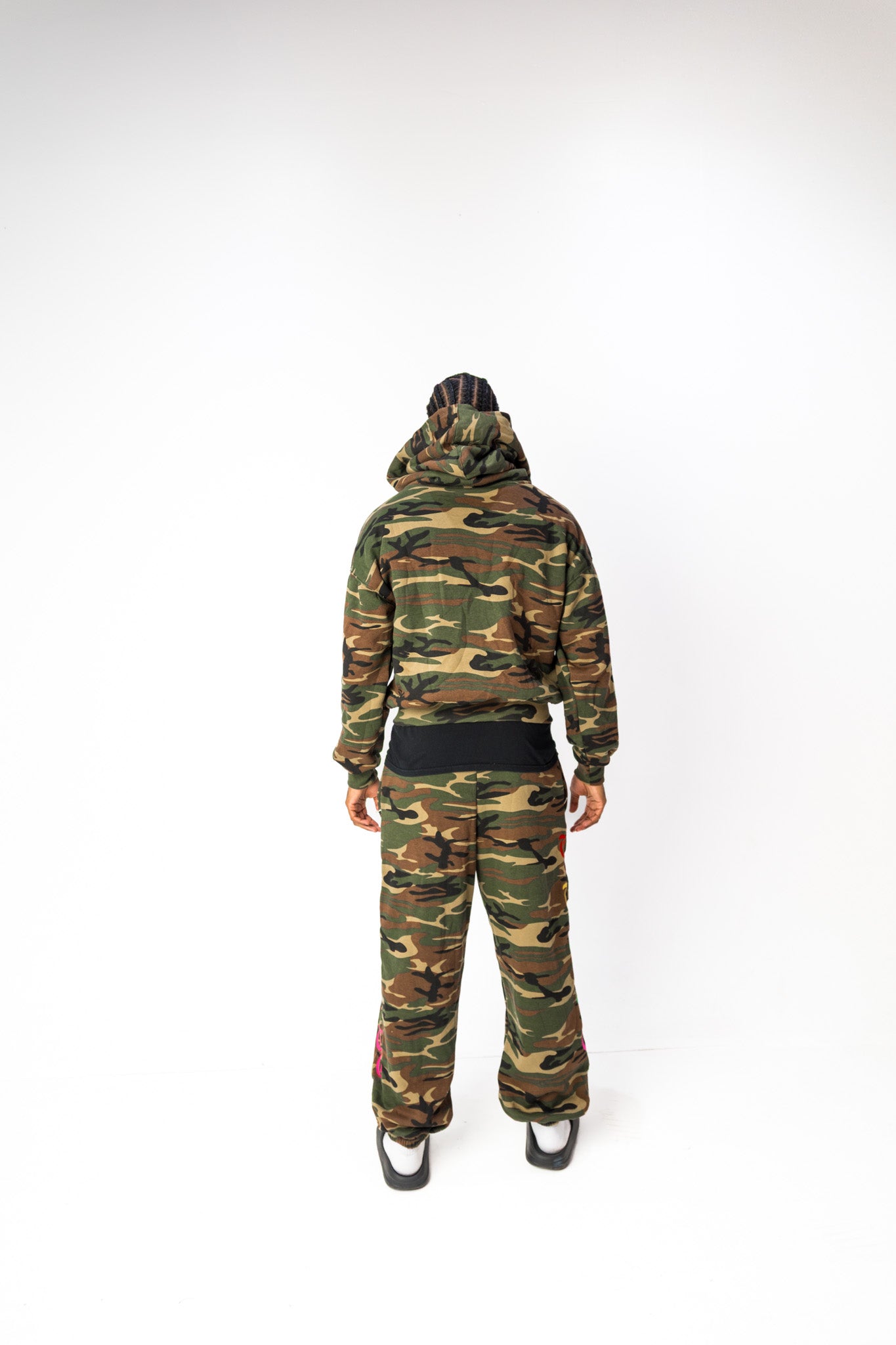 Back model view of Third Gen Camo oversized sweatpants.