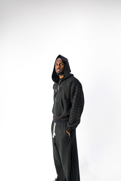 Black model front view of TG Rhinestone oversized, distressed, cropped, rhinestone jacket.