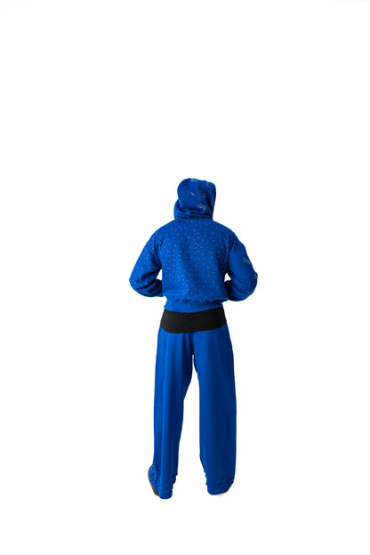 Blue model back view of TG Rhinestone oversized, distressed, cropped, rhinestone jacket.