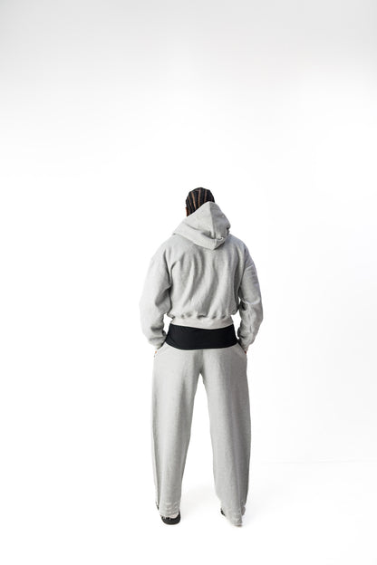 Gray model back view of TG Rhinestone oversized, distressed, cropped, rhinestone jacket.