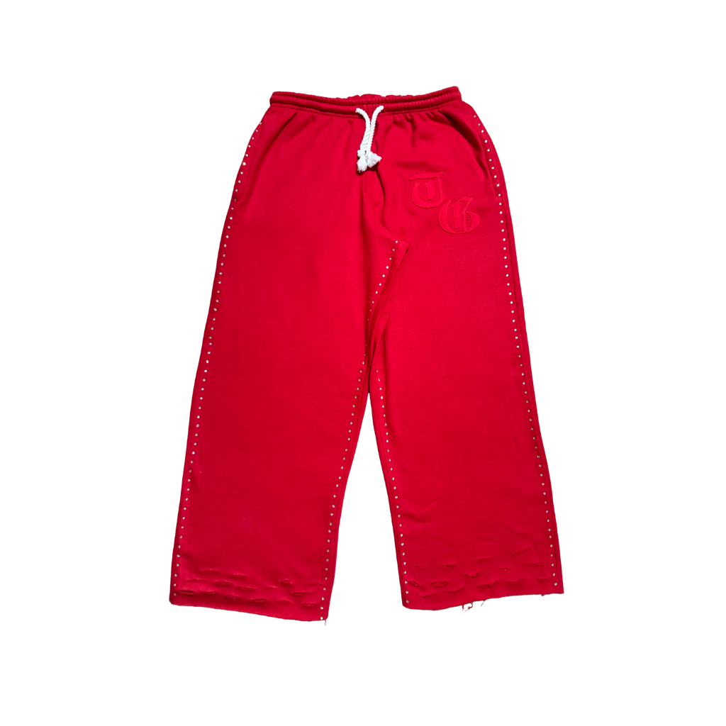 Red front view of TG Rhinestone oversized, distressed rhinestone sweatpants. 